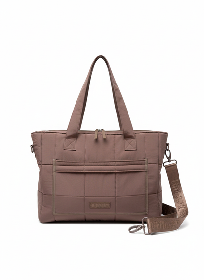 Brown quilted handbag with a shoulder strap on a white background