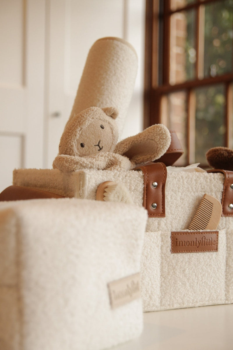 Lamb Cuddly styled in pocketed caddy